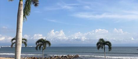 On the beach, sun loungers