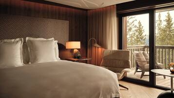 Suíte júnior (Deluxe) | Roupas de cama premium, camas com colchões pillow-top