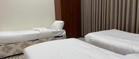 Deluxe Quadruple Room, City View | Desk, free WiFi