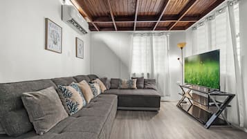 Villa, Private Pool | Living area | 32-inch LED TV with cable channels