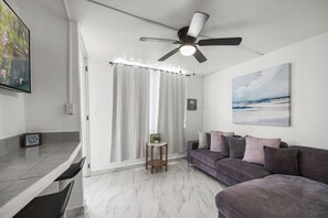 Villa, Private Pool | Living area | 32-inch LED TV with cable channels