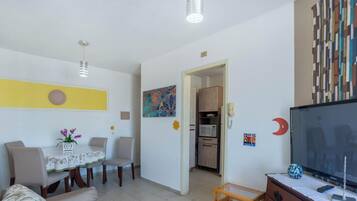Basic Apartment | Living area | 40-inch TV with digital channels