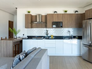 Fridge, microwave, stovetop, coffee/tea maker