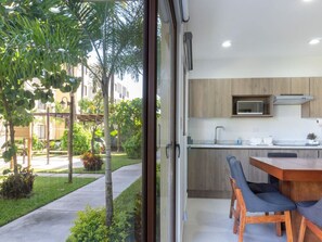 Fridge, microwave, stovetop, coffee/tea maker