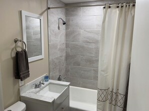 Hair dryer, towels, soap, toilet paper