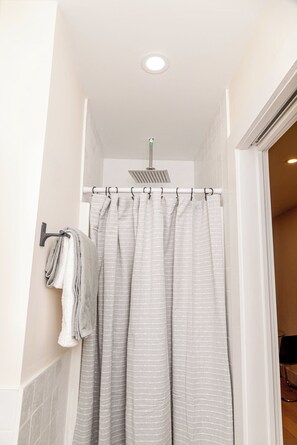 Classic Suite, 1 Queen Bed with Sofa bed, Non Smoking | Bathroom | Shower, hair dryer, towels, soap