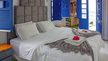 Deluxe Chalet, Multiple Beds, Courtyard View | Minibar, individually decorated, individually furnished, desk