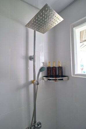 Shower, hair dryer, towels, soap