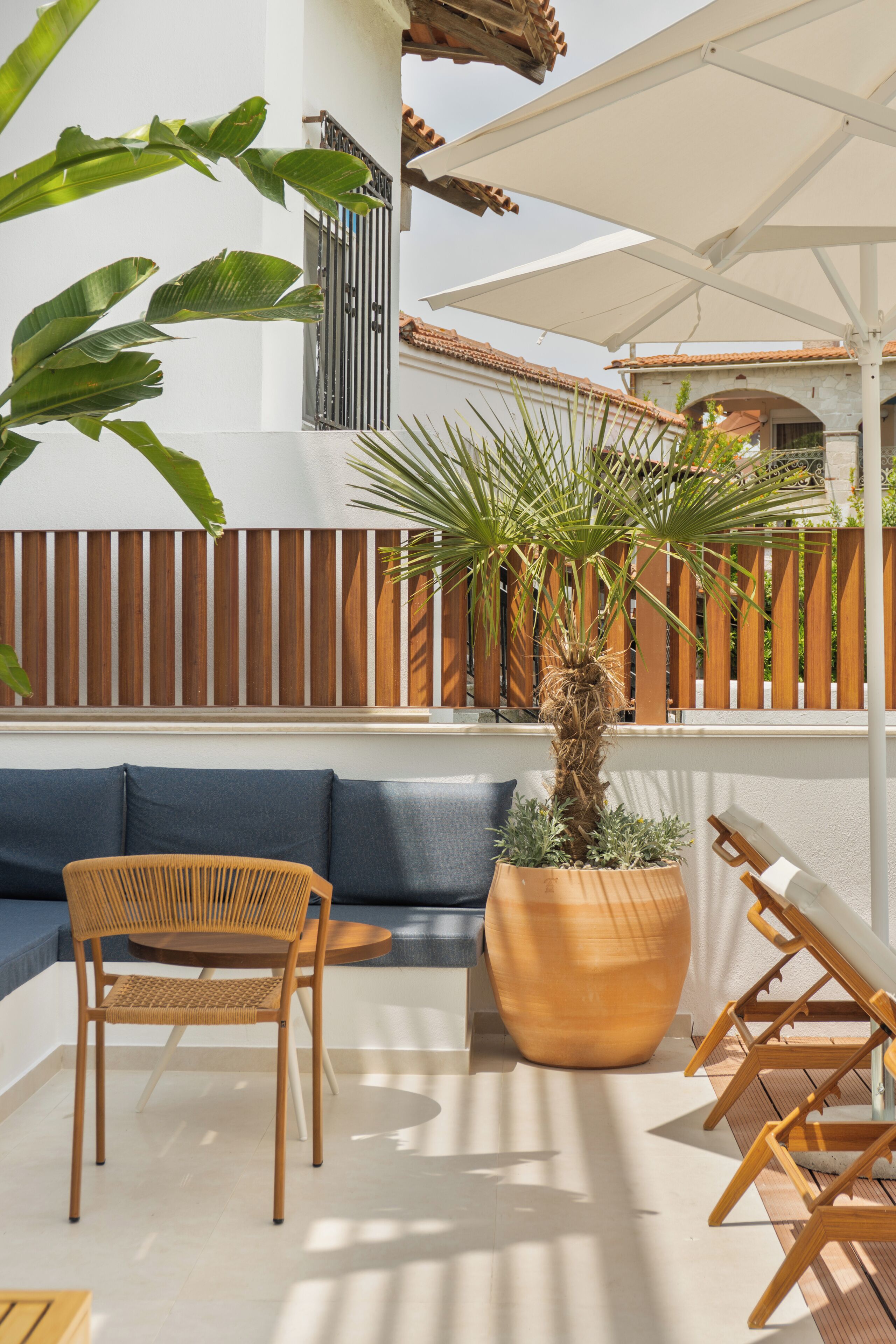 Seasonal outdoor pool, pool umbrellas, pool loungers