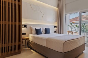 Comfort Suite, Balcony, Courtyard View | In-room safe, desk, laptop workspace, blackout drapes
