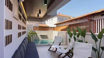 Seasonal outdoor pool, pool umbrellas, pool loungers