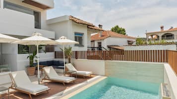 Seasonal outdoor pool, pool umbrellas, pool loungers