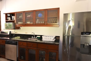Family Villa, Pool View | Private kitchen | Fridge, microwave, oven, stovetop