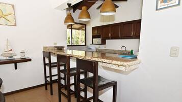 Junior Villa, 2 Bedrooms, Poolside | Living area | 42-inch Smart TV with satellite channels