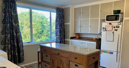 Kick back on Kapiti! Your home away from home, just steps from the beach.
