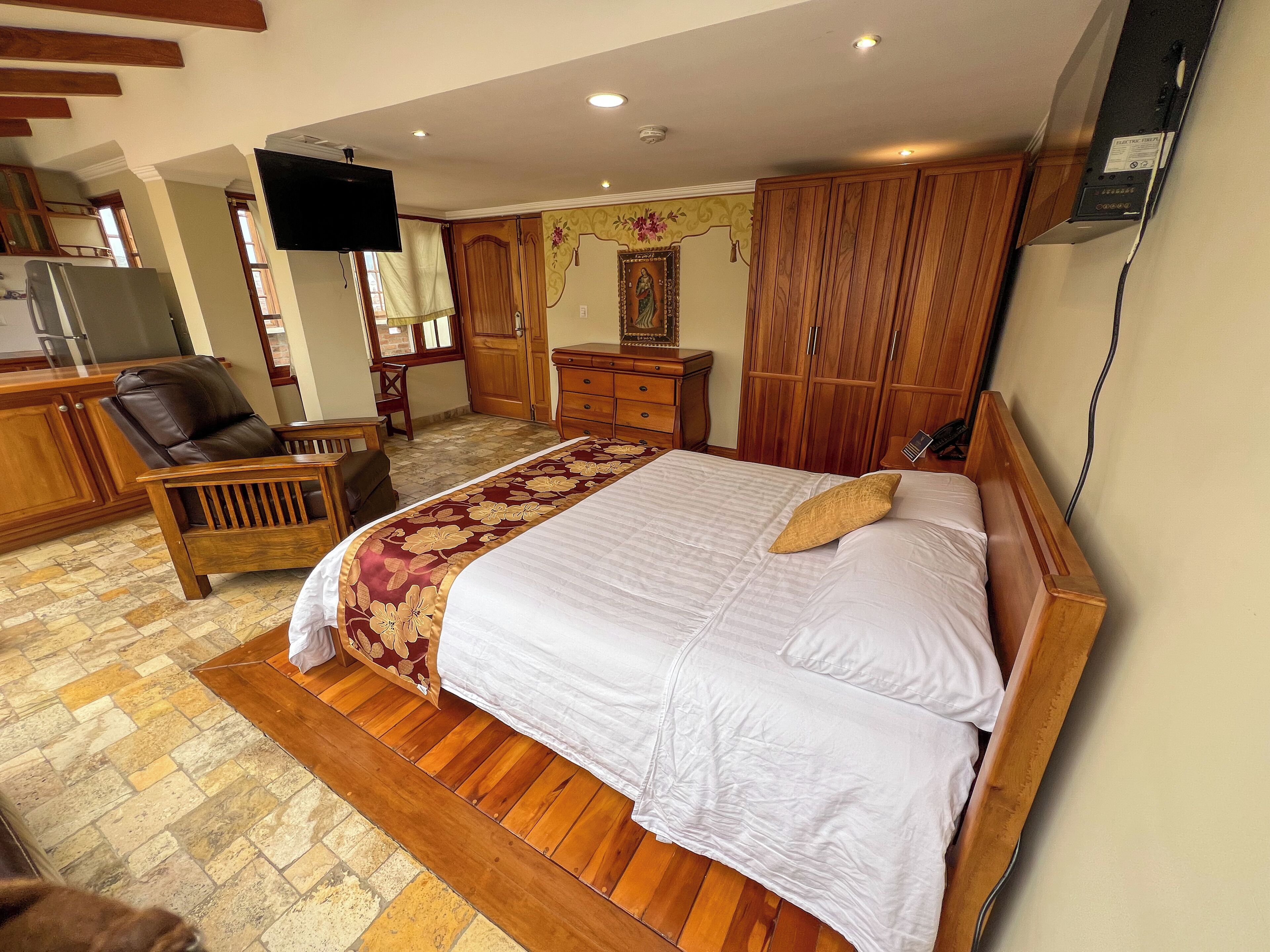 Comfort Suite, City View | In-room safe, desk, laptop workspace, blackout drapes