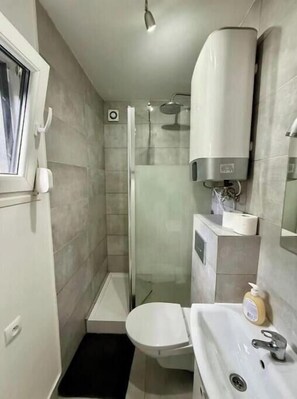 Hair dryer, towels, soap, toilet paper
