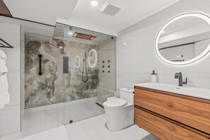 Shower, hair dryer, towels, soap