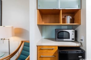 Mini-fridge, microwave, oven, stovetop