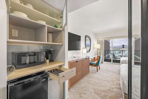 Mini-fridge, microwave, oven, stovetop