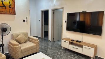 Luksushuoneisto, 1 keskisuuri parisänky ja vuodesohva, keittiö | Oleskelualue