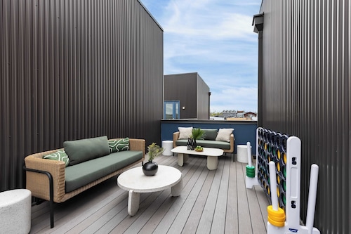 Sleeps 24 Rooftop, Game Room & Outdoor Spaces Just 10 Min to Broadway Outrider by Avantstay