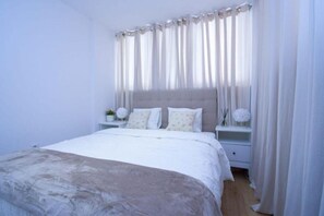 1 habitación, tabla de planchar con plancha, wifi y ropa de cama 