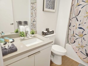 Hair dryer, towels, soap, shampoo
