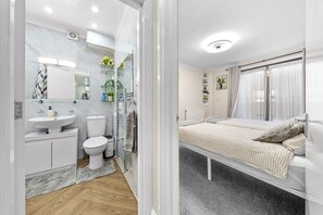 Hair dryer, towels, soap, shampoo