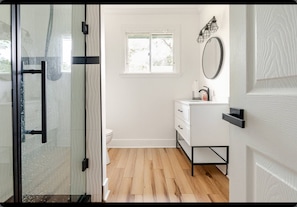 Shower, towels, soap, toilet paper