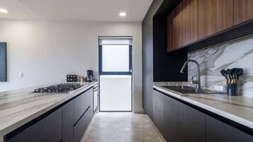 Fridge, microwave, stovetop, coffee/tea maker