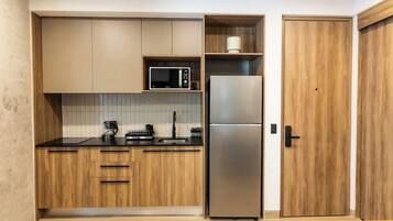 Fridge, stovetop, cookware/dishes/utensils