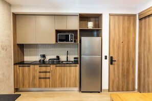 Fridge, stovetop, cookware/dishes/utensils