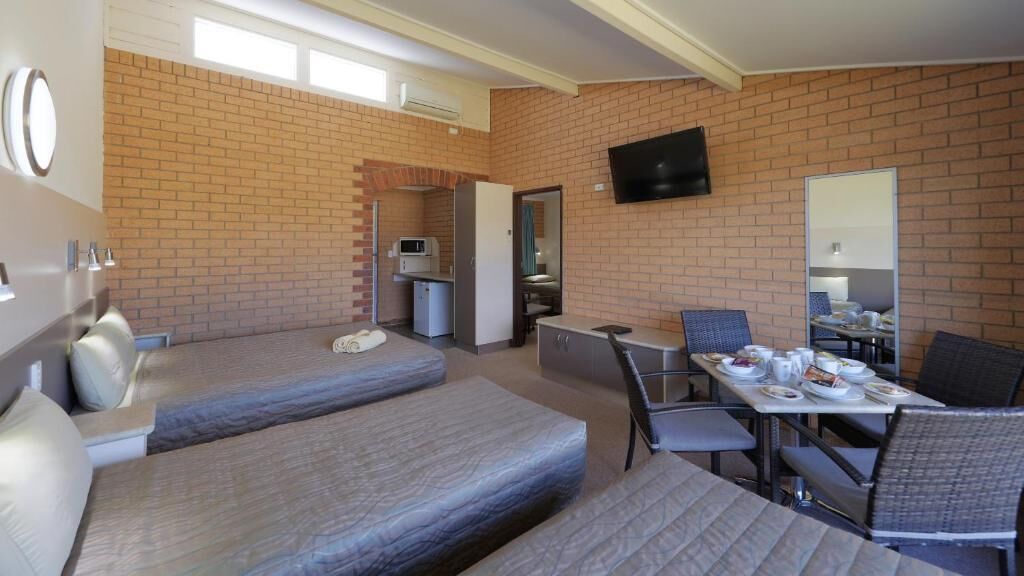 Family Suite, Garden View | Desk, iron/ironing board, free WiFi