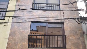 Exterior detail - Joint apartments near Bello Ant’s Town Square (Bello)