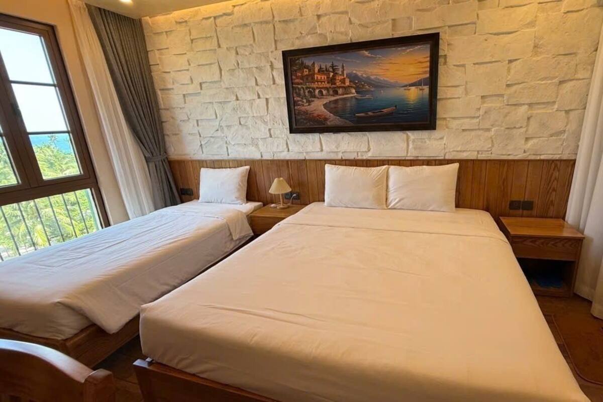 Quarto triplo, vista para a cidade | Wi-Fi de cortesia