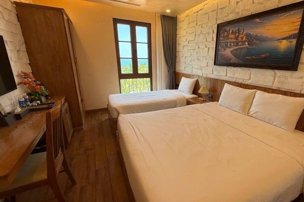 Quarto triplo, vista para o mar | Wi-Fi de cortesia