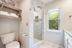 Shower, hair dryer, towels, soap