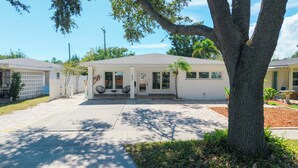 A single-story house with a front porch, a mailbox, and a number '622' on the door.