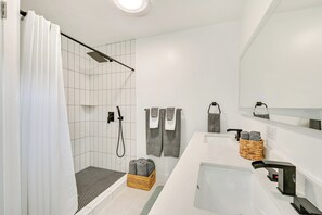 Shower, towels, soap, toilet paper