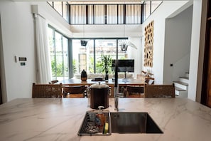 Four-Bedroom Family Pool Villa | Private kitchen | Fridge, microwave, cookware/dishes/utensils, dining tables