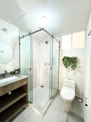 Hair dryer, towels, soap, toilet paper