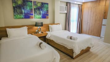 Kamar Double Deluks | Tirai kedap cahaya, kedap suara, setrika/meja setrika, dan Wi-Fi gratis