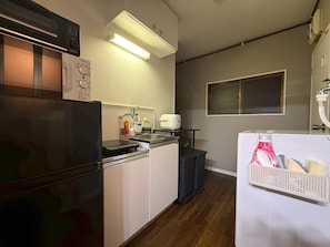 Basic Apartment | Private kitchen | Full-size fridge, microwave, oven, stovetop
