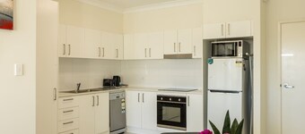 Cozy 1BR Unit in Springwood Great Location Parking