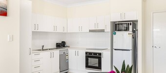 Cozy 1BR Unit in Springwood Great Location Parking