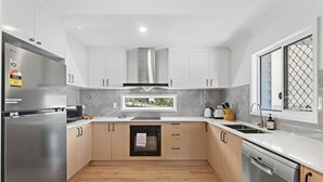 Fridge, microwave, oven, stovetop - Bright 3BR Home| 2 Baths |Close to CBD & Hospitals (Herston)