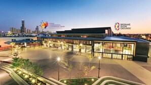 The Royal International Convention Centre in Brisbane, Australia, featuring a modern architectural design with a spacious outdoor area and well-lit pathways. - Bright 3BR Home| 2 Baths |Close to CBD & Hospitals (Herston)