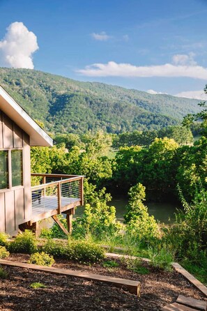Property grounds - Hygge River House | Modern Retreat w/ Hot Tub, Fire Pit & River Views (Strasburg)