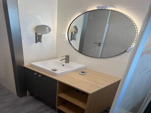 Apartment | Bathroom | Hair dryer, towels, soap, shampoo - Valras-plage Family Getaway: Beach, Balcony & Parking! (Valras-Plage)
